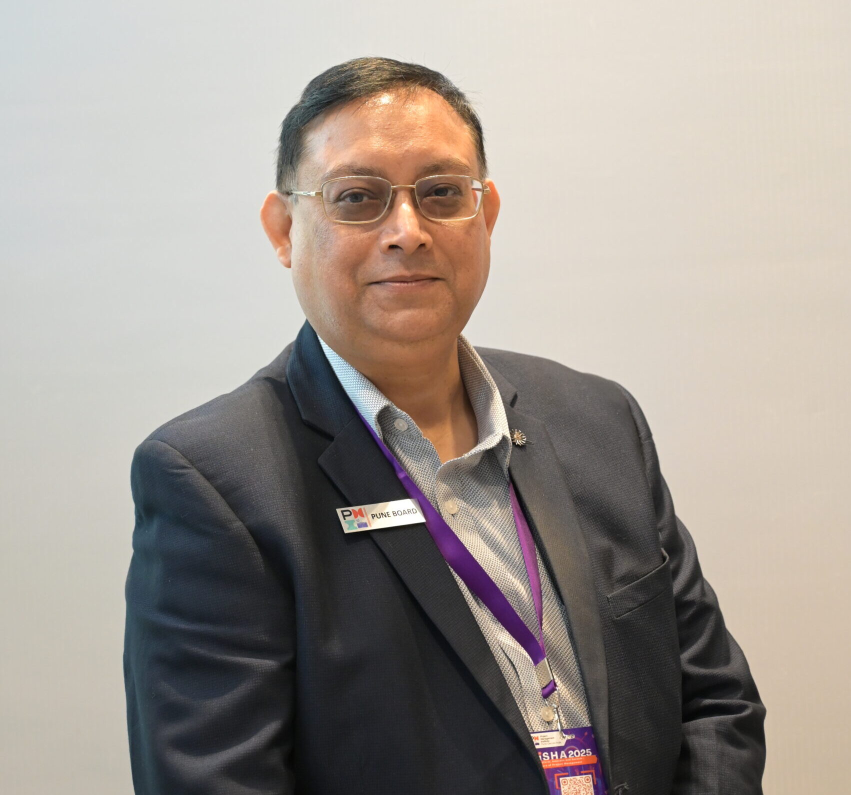 Professional CEO portrait of Anil Prakash, man aged 30-45, confident expression, business attire